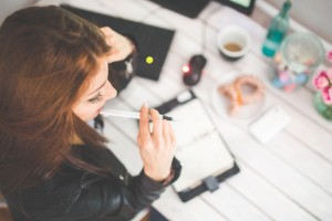 girl at desk with planner